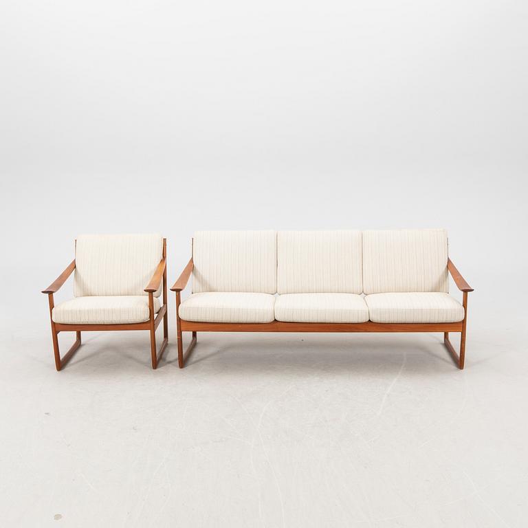 Peter Hvidt & Orla Mølgaard Nielsen, a teak sofa and armchair "Slädes" France & Daverkosen, designed in 1961.