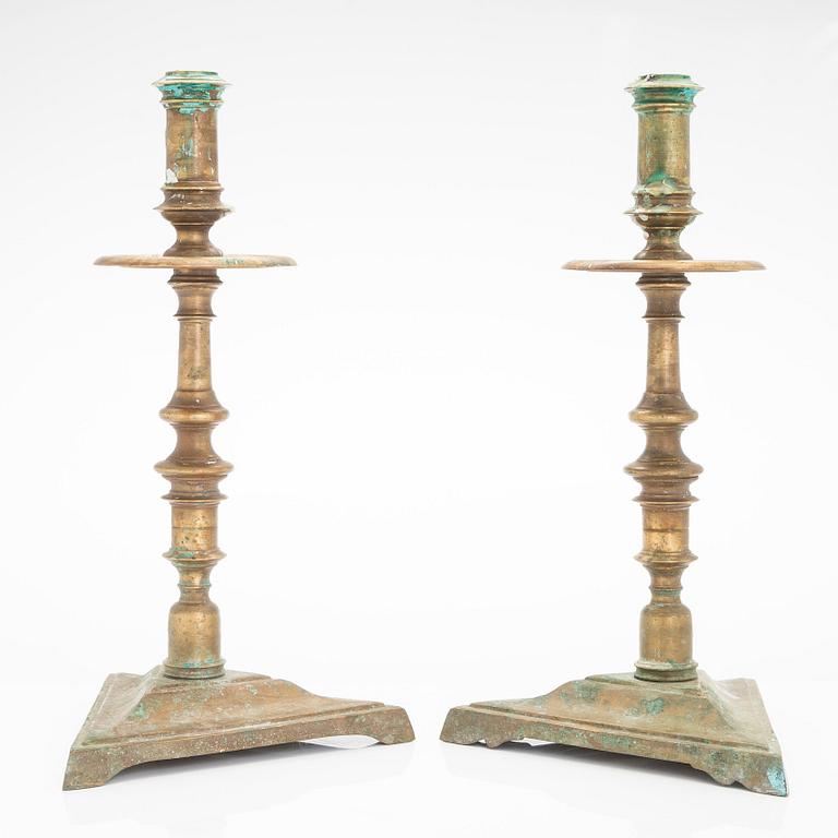 A pair of 18th century candlesticks.