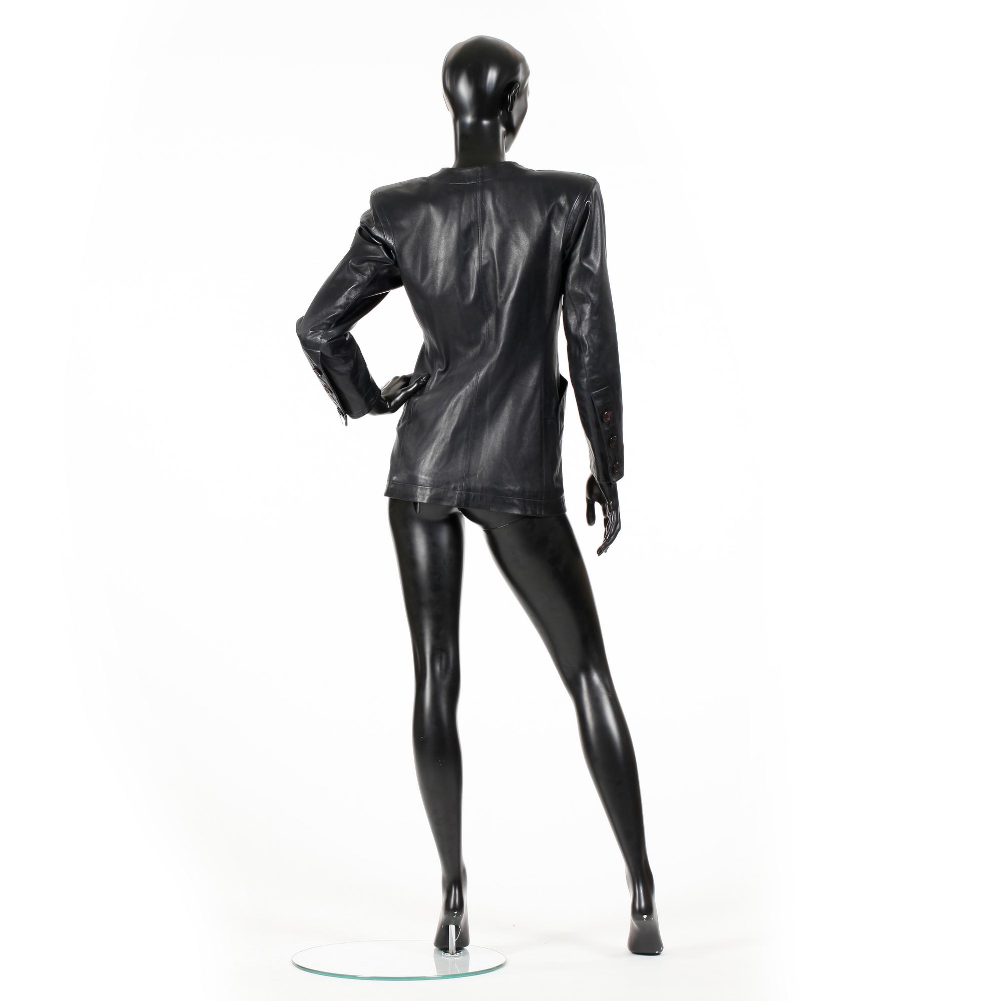 YVES SAINT LAURENT, a black leather jacket.