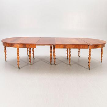 A Neo Renaissance mahogany dining table later part of the 19th century.