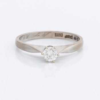 DIAMOND RING 18K whitegold 1 brilliant-cut diamond 0,25 ct inscribed.