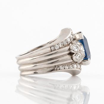 A WA Bolin platinum ring set with a faceted sapphire and old- and eight-cut diamonds.
