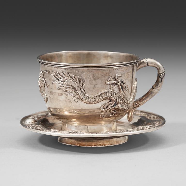 An export silver cup and saucer, probably Shanghai, early 20th century.