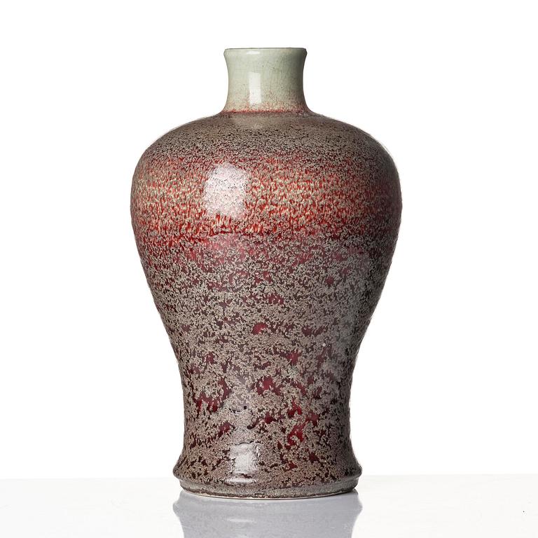 A red and ge glazed Meiping vase, Qing dynasty, 18th century.