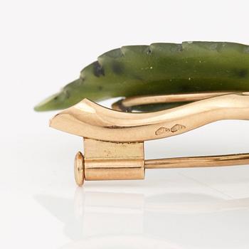 A corall and nephrite brooch.
