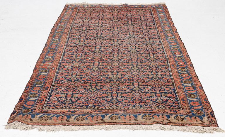 An antique Malayer carpet, west persia c 289 x 149 cm.