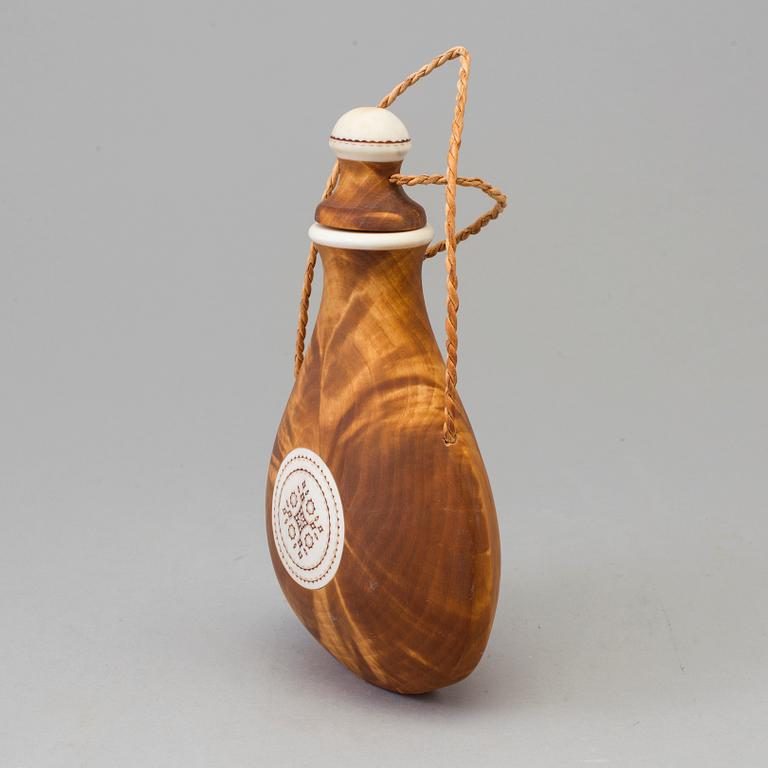 a traditional sami salt bottle by Tore Sunna.