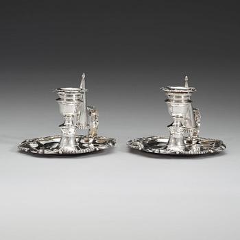 A pair of English 19th century silver chamber-candlesticks, marks of Benjamin Smith II and James Smith III, London 1808.