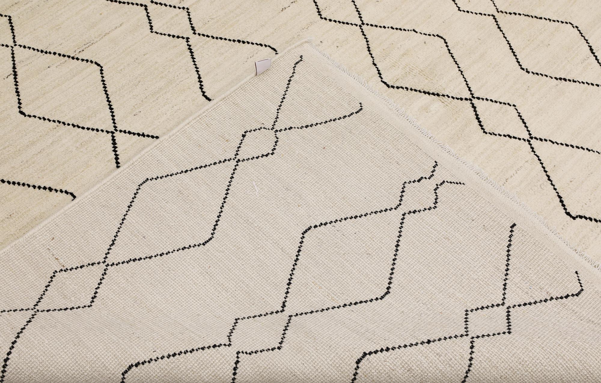 A Moroccan rug, approx. 292 x 203 cm.