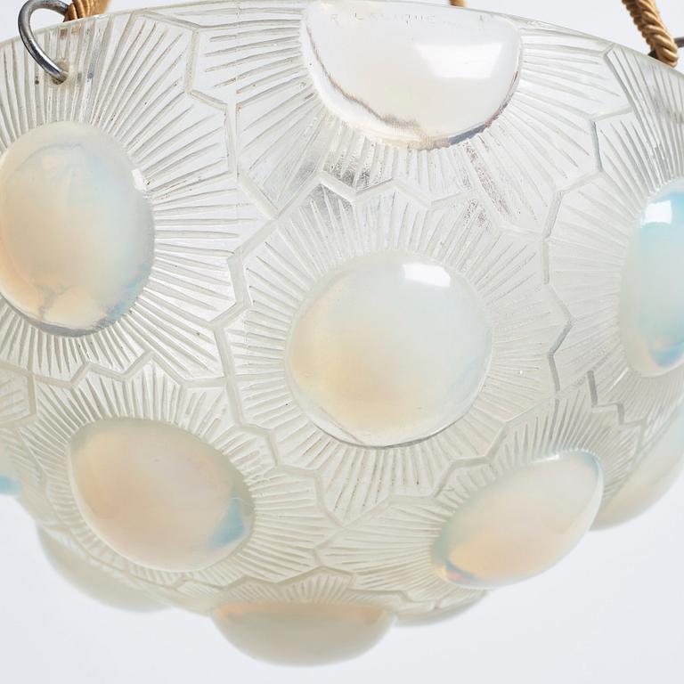 René Lalique, a 'Soleil' moulded opalescent glass ceiling light, France 1920-30s.