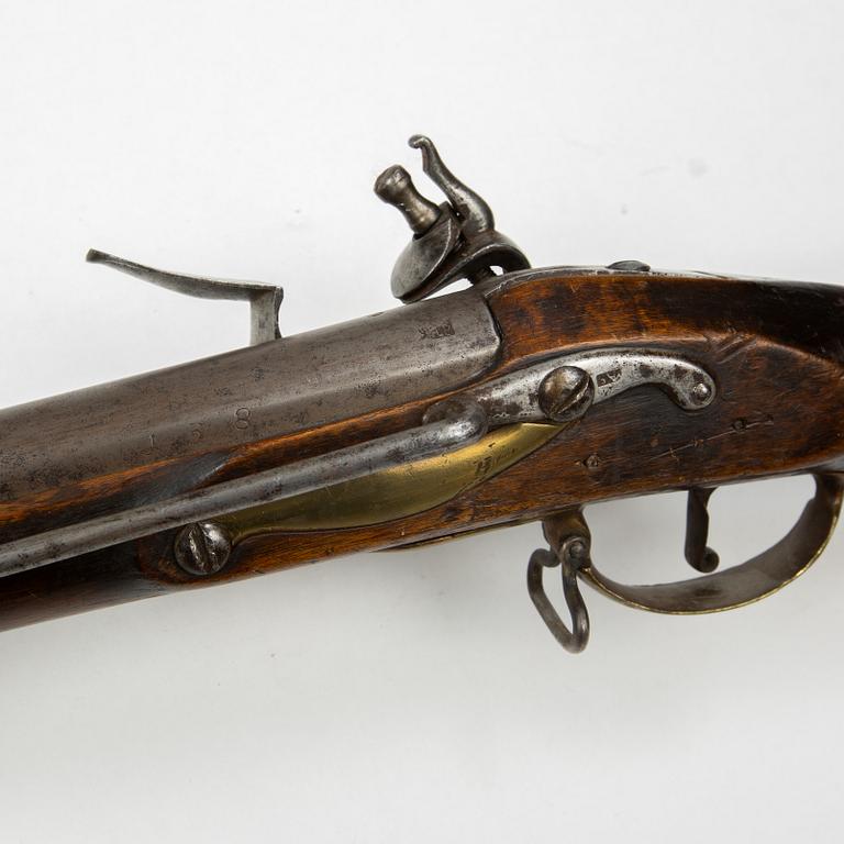 An 18th century flintlock carbine.