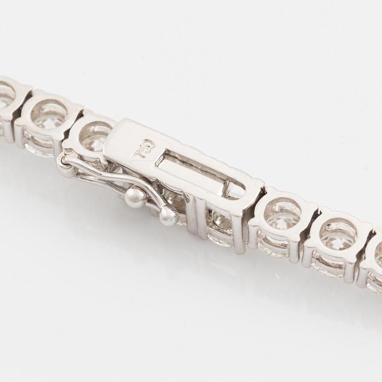 Collier rivière 18K vitguld med 148 runda briljantslipade diamanter.