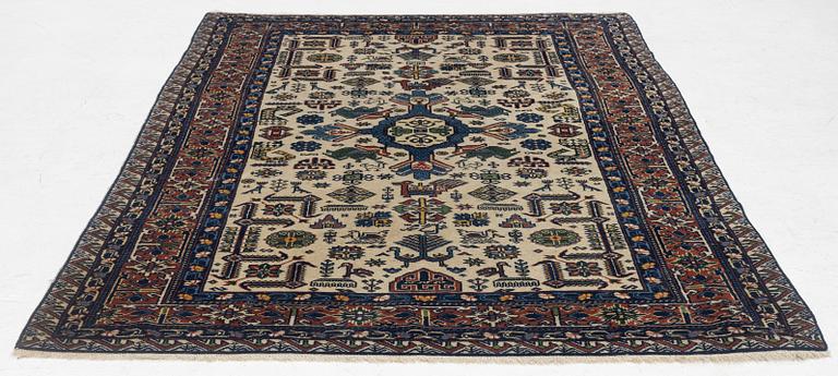 A figural oriental carpet, c. 205 x 134 cm.