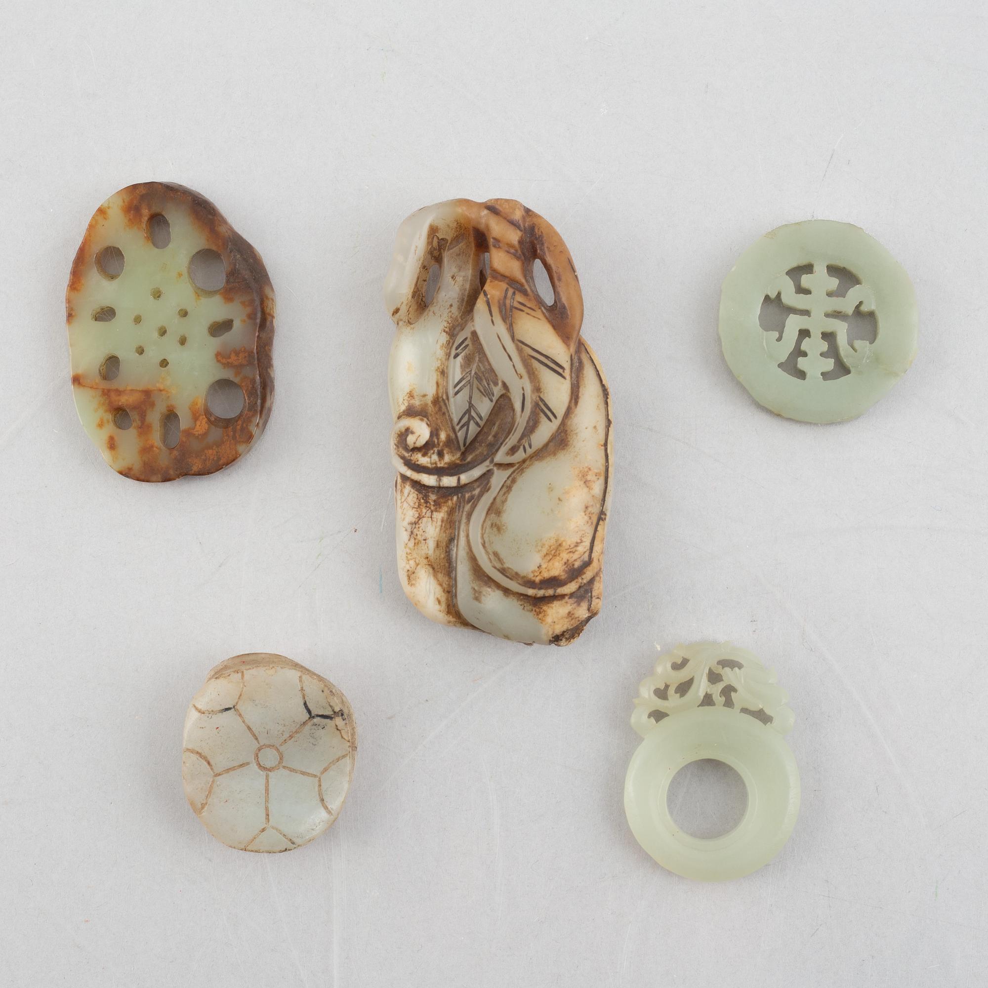 A group of five Chinese stone charms, 20th century.