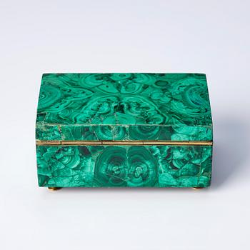 A Russian Nicholas II malachite-veneered box, circa 1900.
