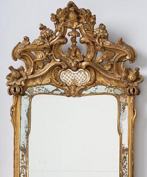 A rococo giltwood mirror, Stockholm, later part 18th century.
