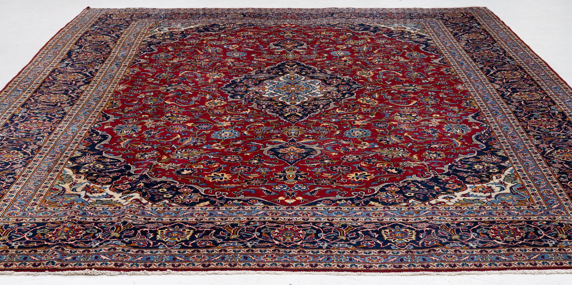 A Keshan carpet, c. 384 x 300 cm.