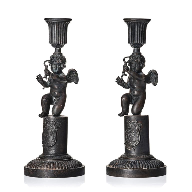 A pair of German (Berliner Eisen) Empire iron candle sticks.