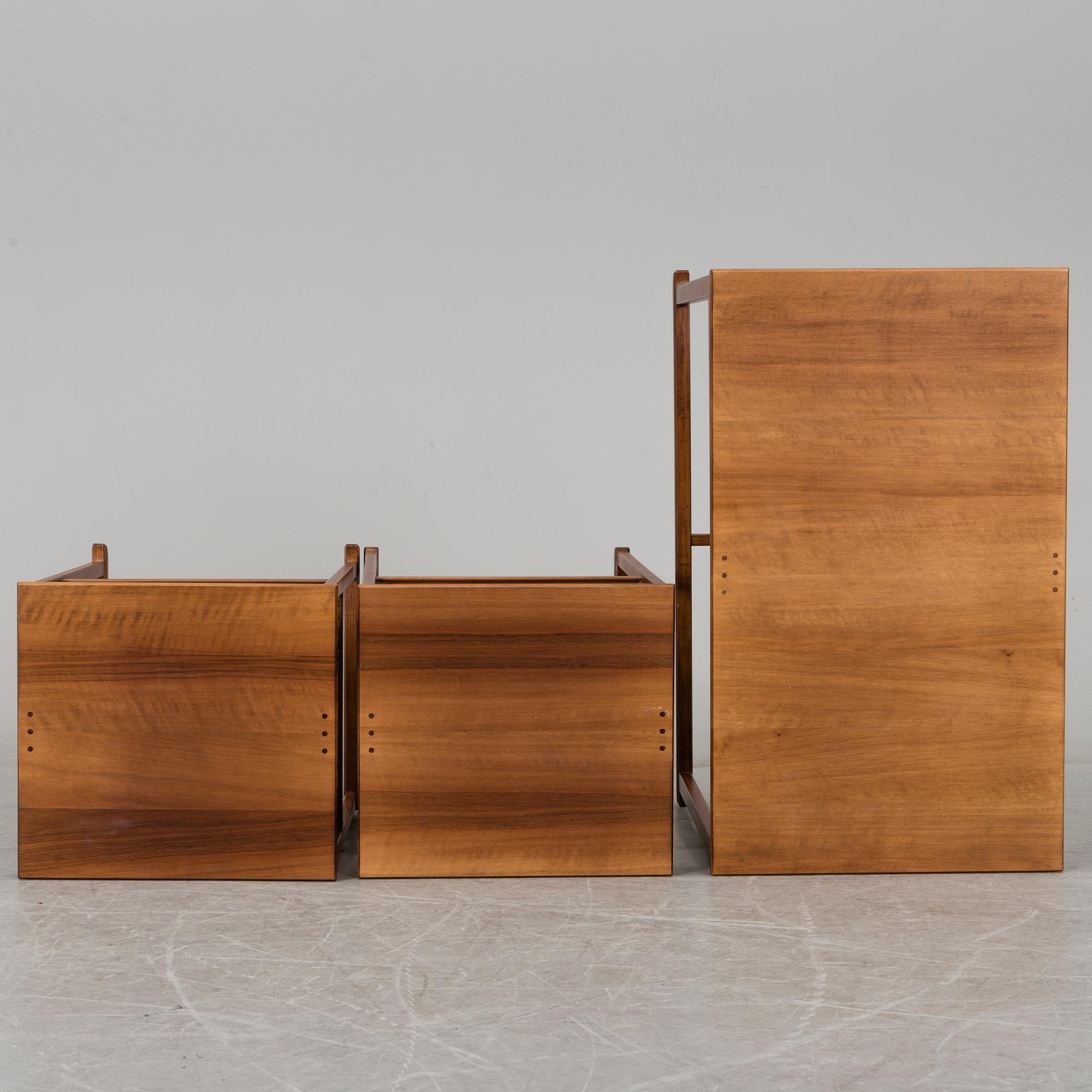 CARL MALMSTEN, a 'Släden' nest of three mahogany tables.