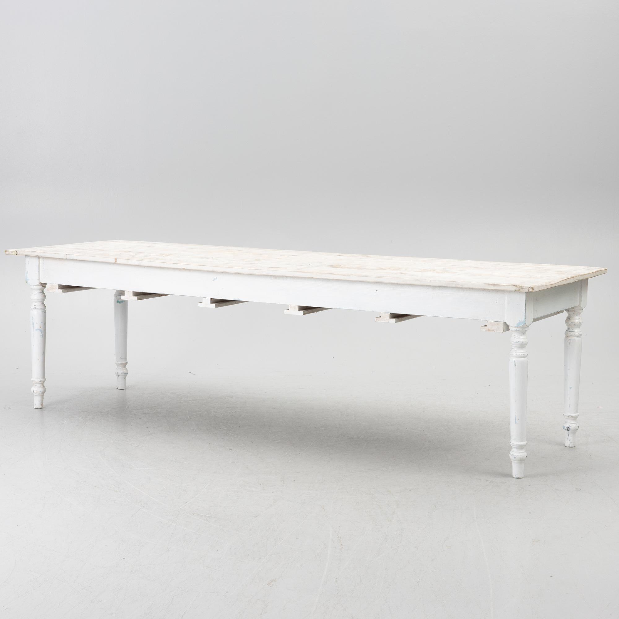 A table with stools, 20th/21st century.