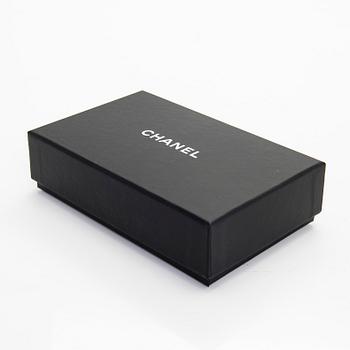 Chanel, A "19 O-coin purse" wallet.