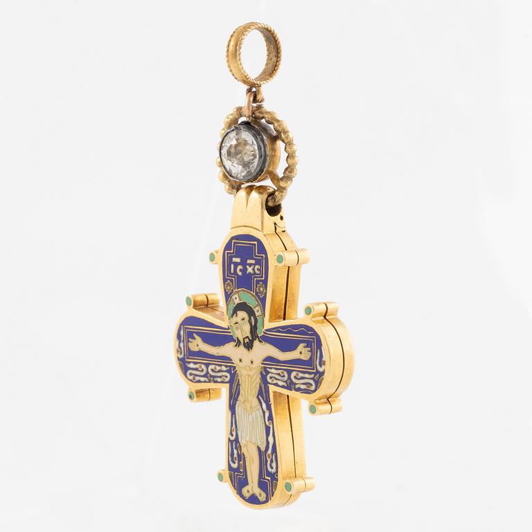 Cross 18K gold with enamel and white stone with relic compartment.