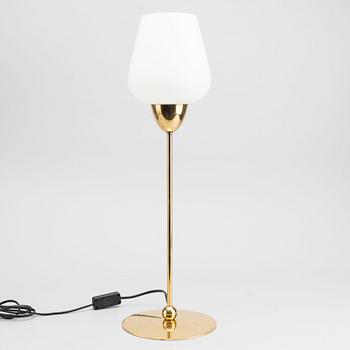 A LUMESS TABLE LAMP MADE IN SWITZERLAND.