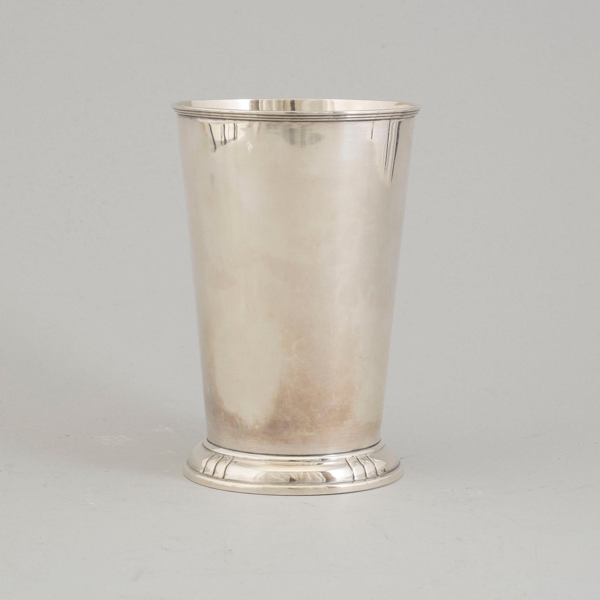 A parcel-gilt sterling silver vase from Aktiebolaget Ikora, Stockholm, 1953.