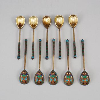 A Russian early 20th century set of ten silver-gilt and enamel tea-spoons, unidentified makers mark, Moscow 1899-1908.