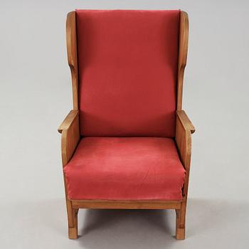 Axel Einar Hjorth, a 'Lovö' stained pine armchair, Nordiska Kompaniet, Sweden 1930's.