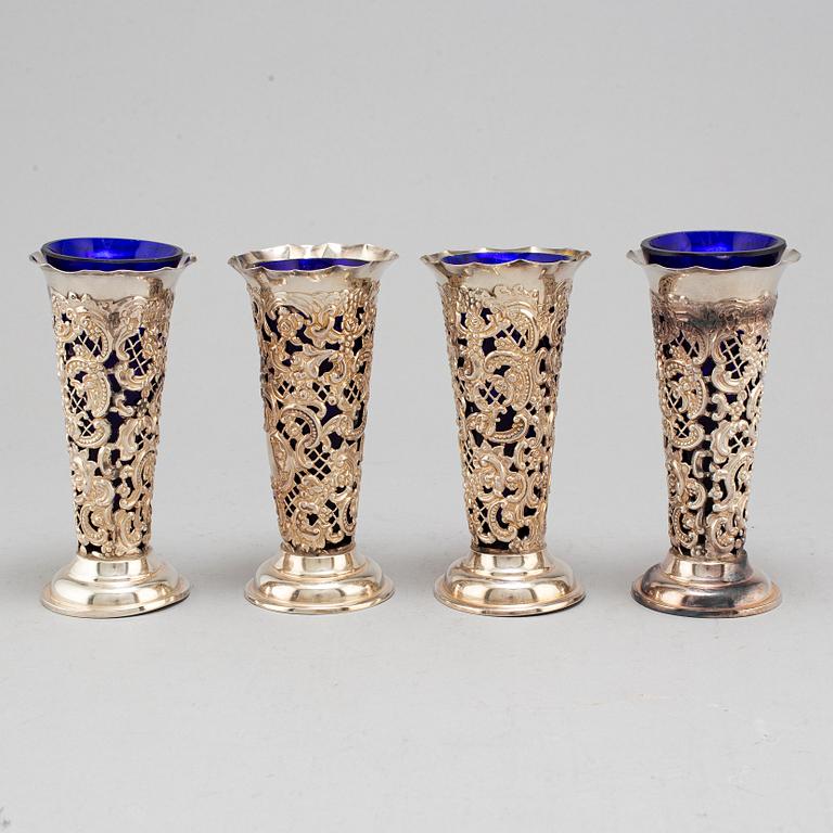 WILLIAM COMYNS, four silver vases, London, England, 1905.