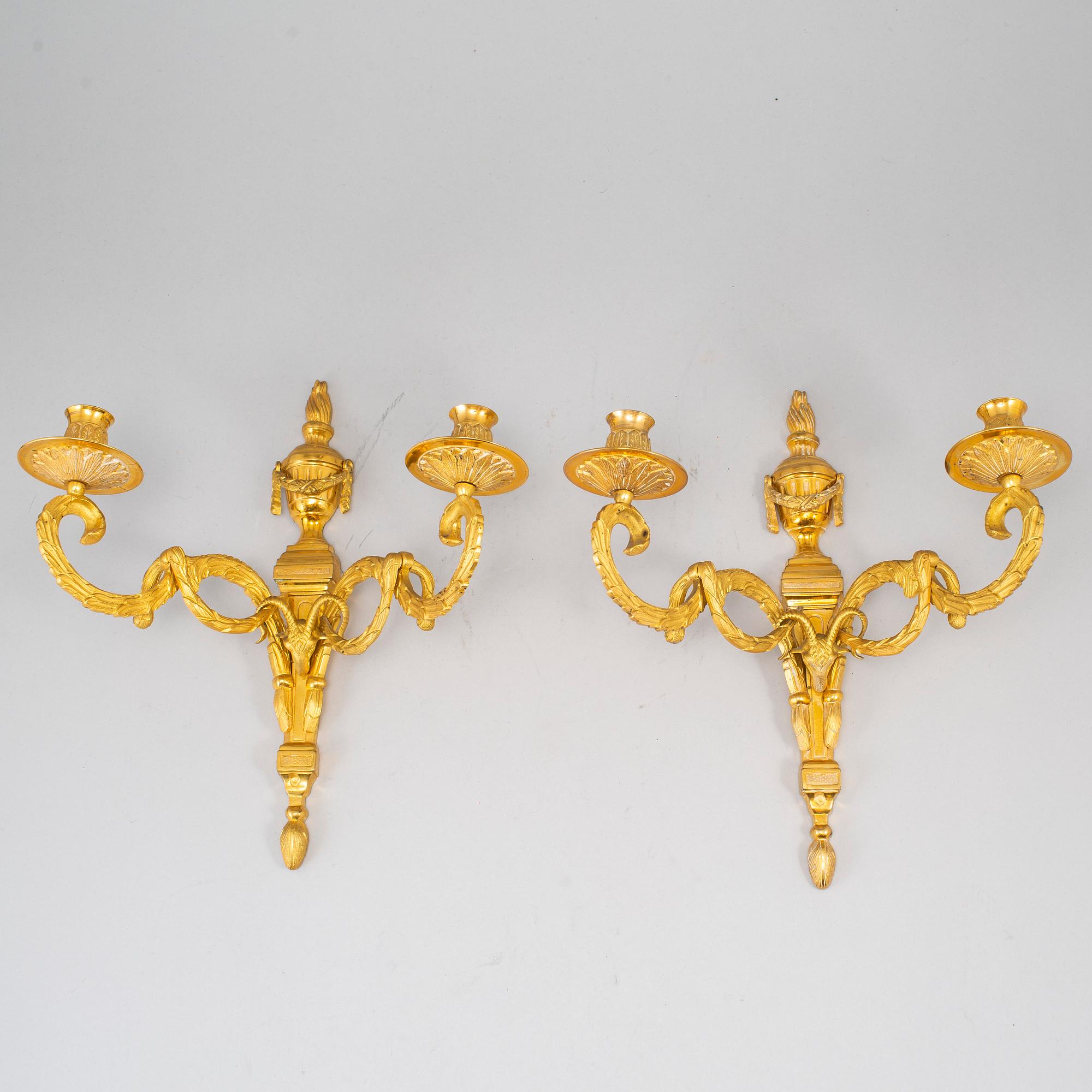 A 20th Century pair of Louis XVI style wall sconces.