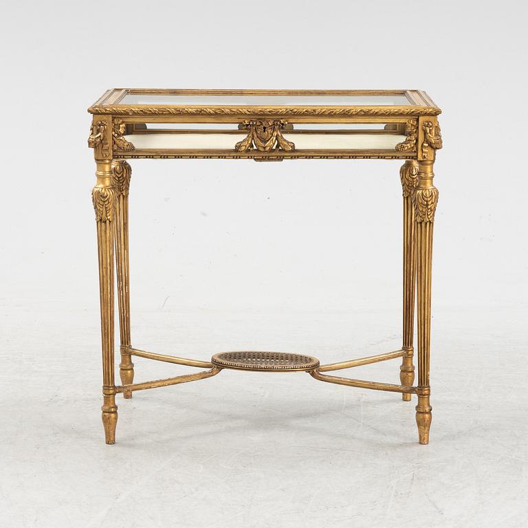 A bronzed display table, early 20th Centiury.