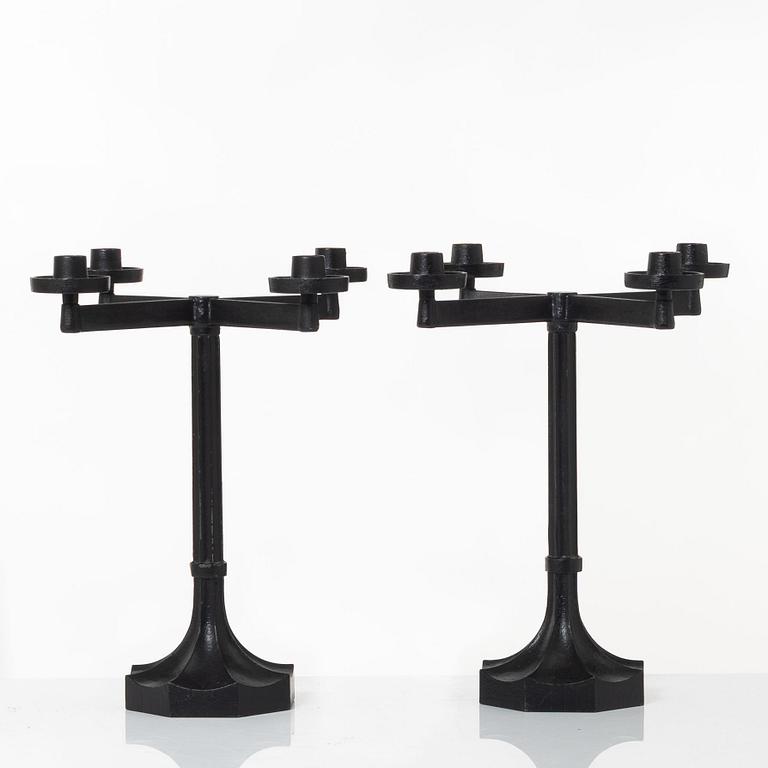 Sigurd Persson, a pair ofa cast iron candelabras, Kockums 1965.