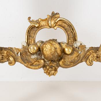 A Rococo revival mirror and a console table, second half of the 19th Century.