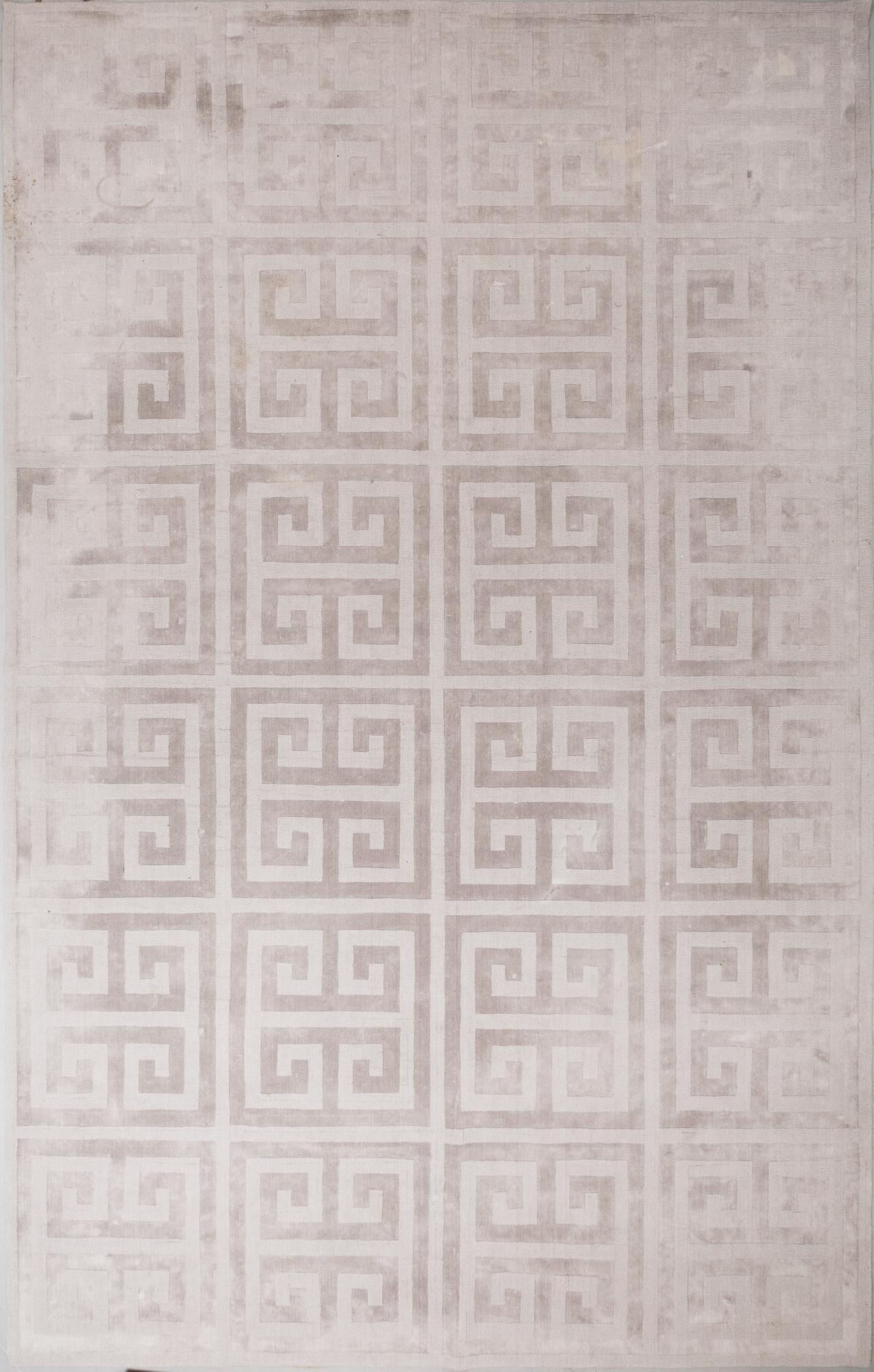 A Layered "Wool Cubes" carpet, 390x620 cm.