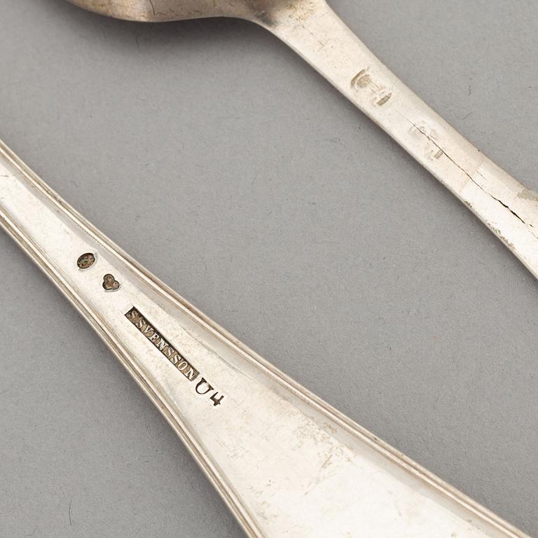 A set of eight silver spoons and a serving spoon, incl with the mark of PM Wallengren 1845.