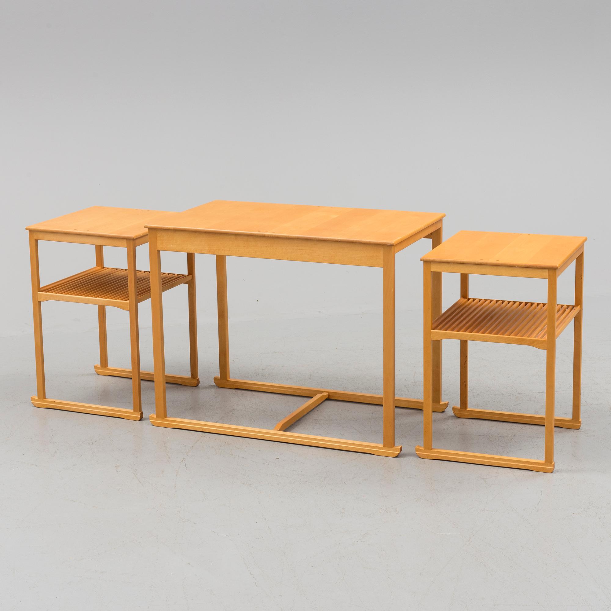 A Swedish Carl Malmsten "The Sled" birch side table nesting table i three parts, Åfors Möbelfabrik.