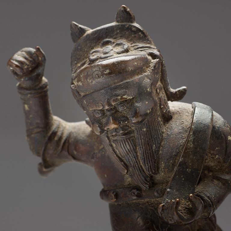 A bronze figure of a deity, Qing dynasty, 17/18th Century.