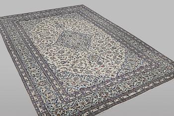 A carpet, Kashan, ca 355 x 247 cm.