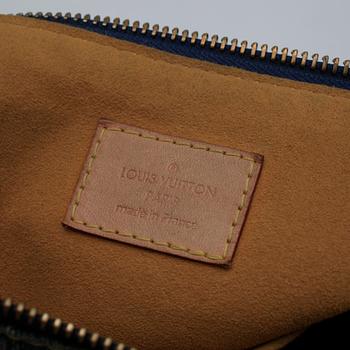 LOUIS VUITTON, a Monogram Denim "Baggy PM M95049" shoulder bag.