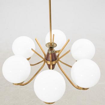 Taklampa 1900-talets mitt.