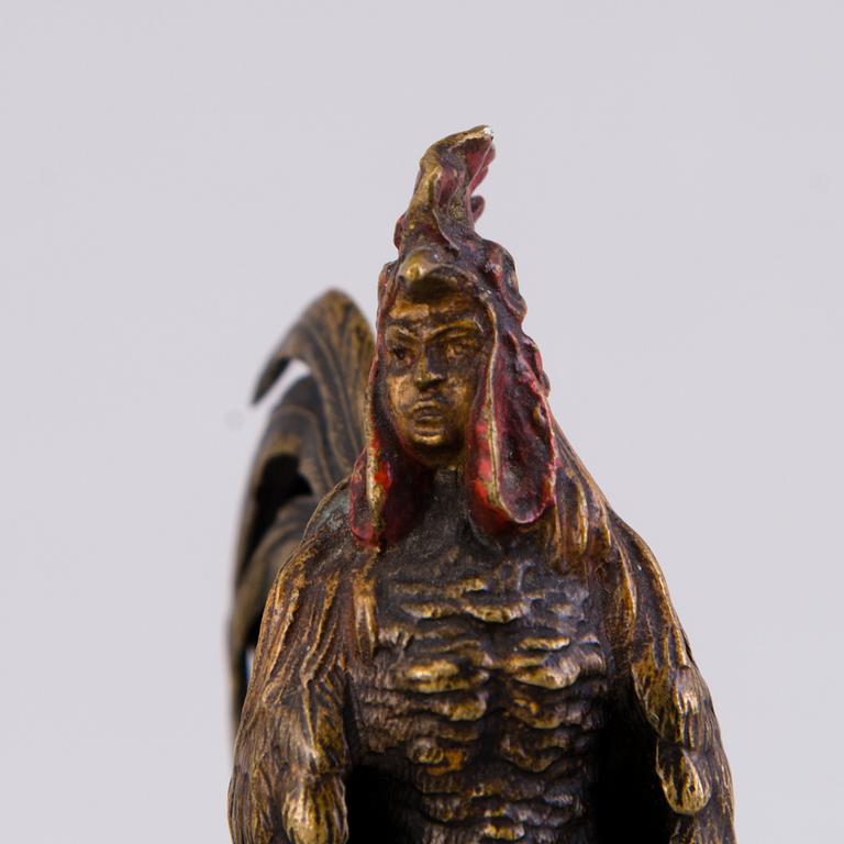 A MINIATURE SCULPTURE, painted bronze, early 20th century.