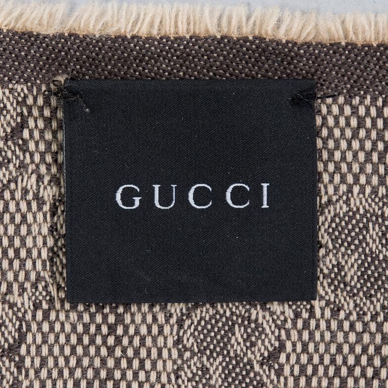 Gucci, A wool and silk scarf.