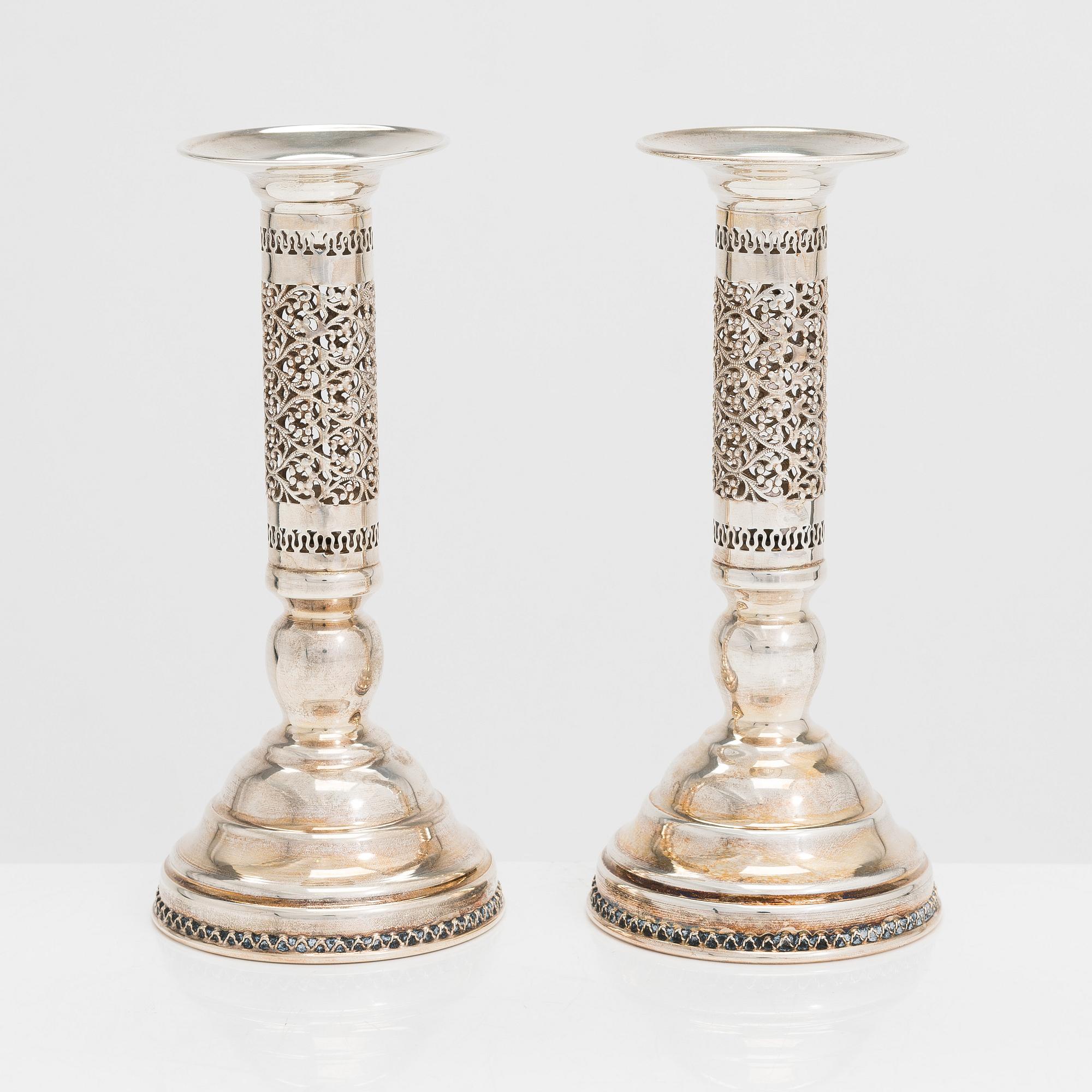 A pair of sterling silver candlesticks, latter half of the 20th century. Unidentified maker's mark.