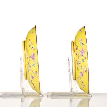 A pair of yellow ground famille rose dishes, Qing dynasty, with Guangxu mark and period, circa 1900.