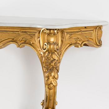 A gilt wood mirror and marble top console table, early 20th Century.
