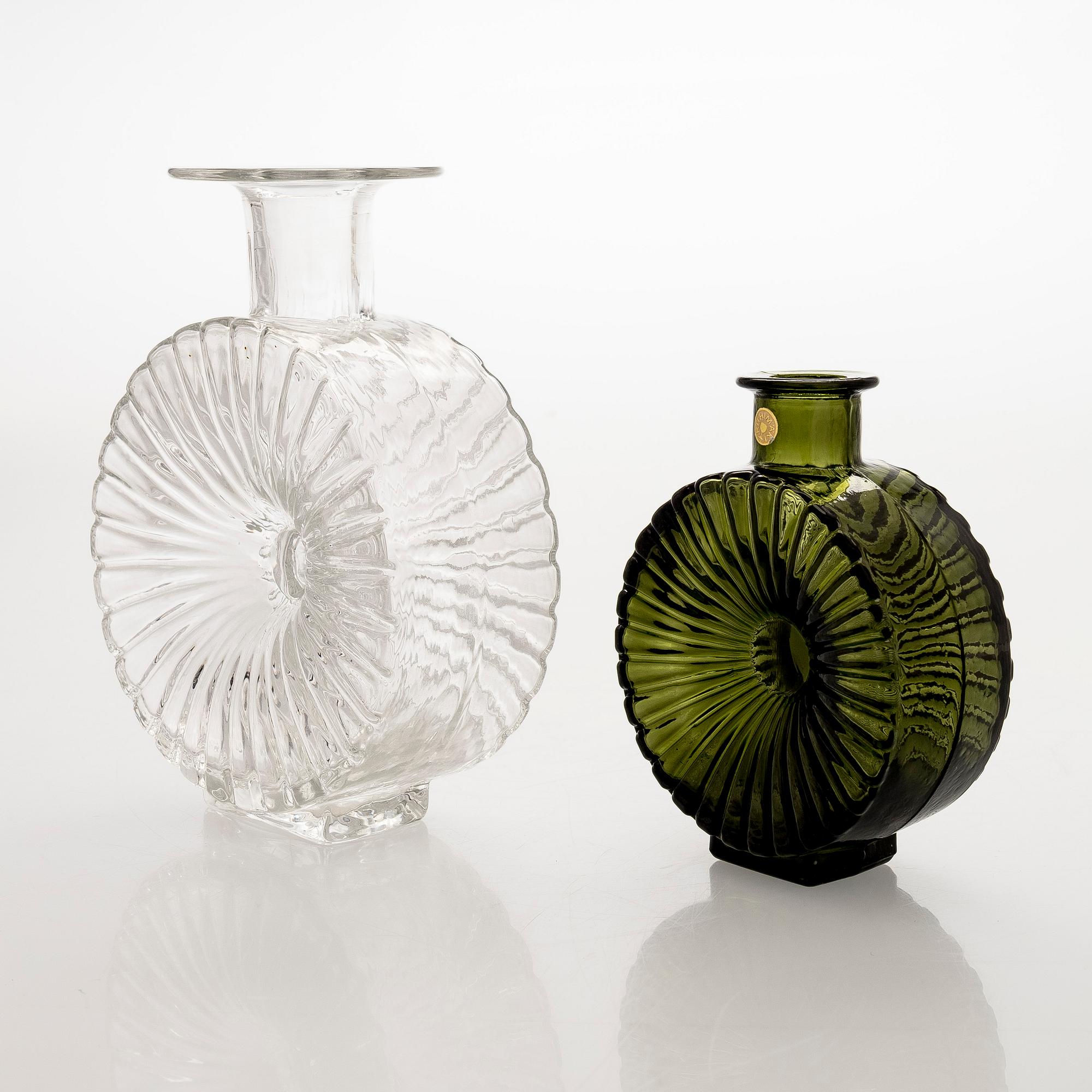 Helena Tynell, two glass 'Sun bottle' bottles for Riihimäen Lasi Oy. In production 1964-1974.