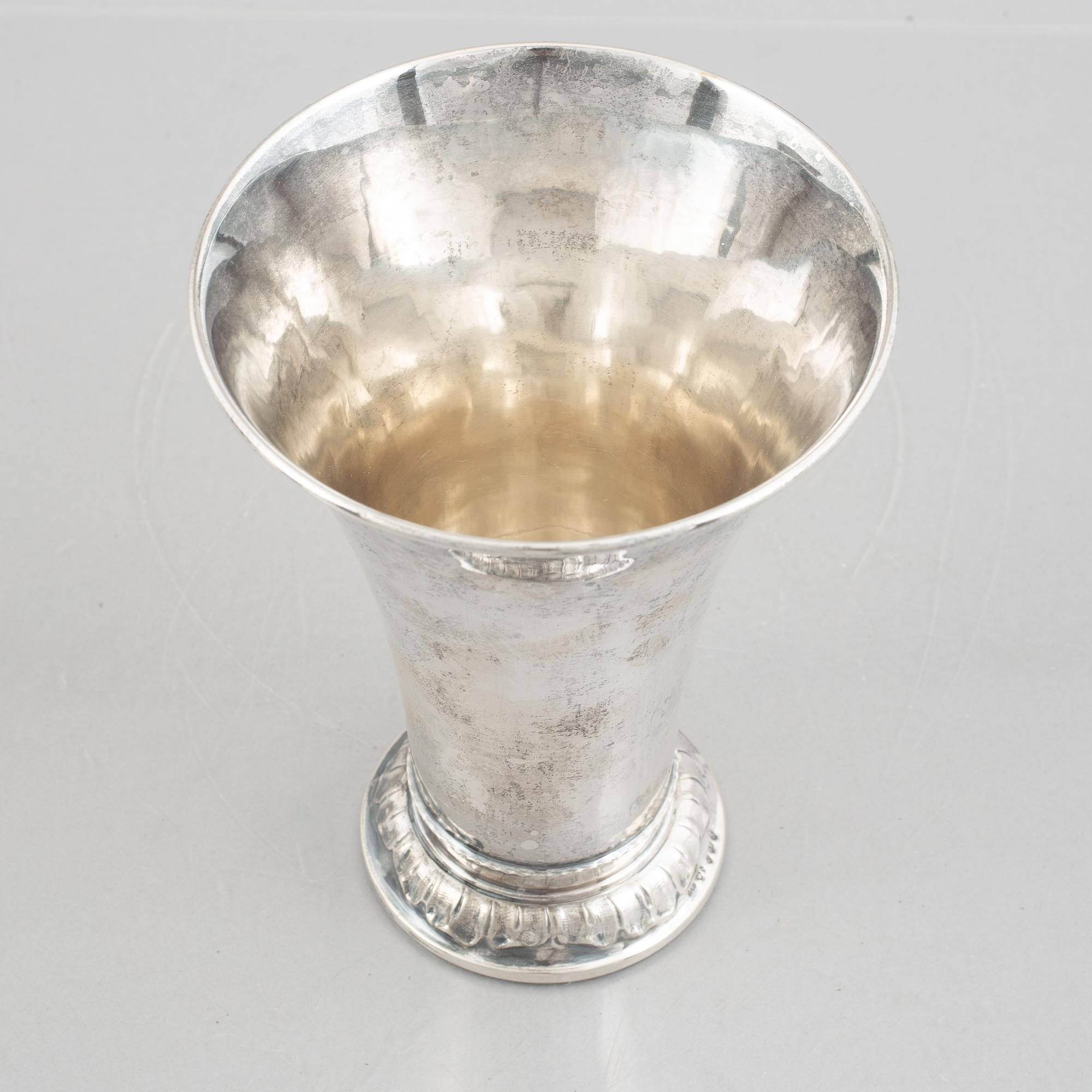 A set of three Swedish silver beakers, including CG Hallberg, Stockholm 1951.