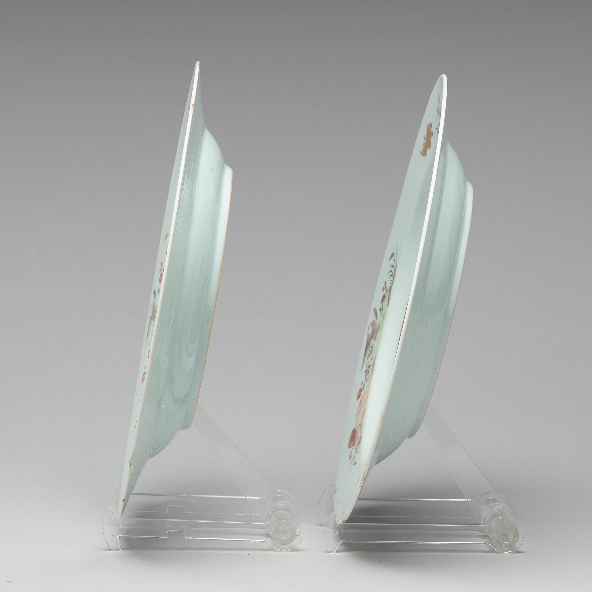 A pair of famille rose 'double peacock' dishes, Qing dynasty, Qianlong (1736-95).